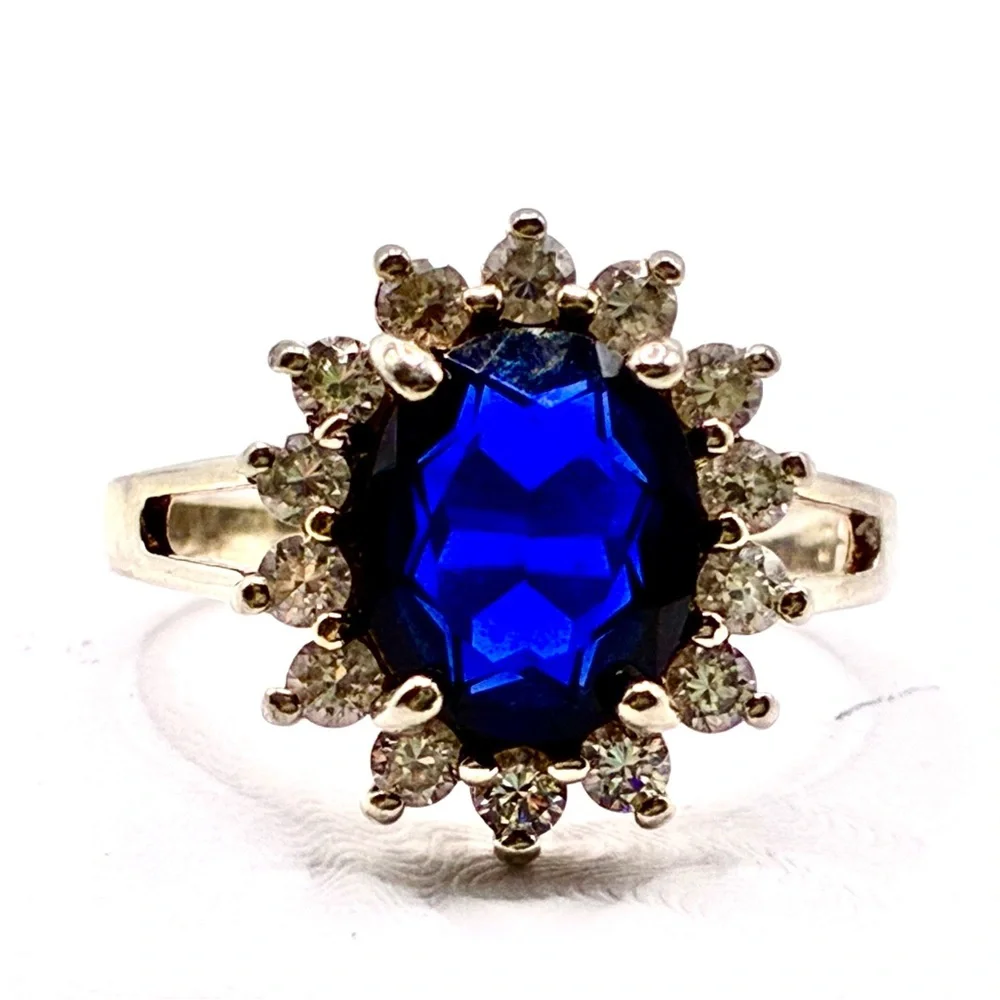 VTG Signed JC Oval Cut Cubic Zirconia Sapphire with Halo of CZ’s In Silver Tone